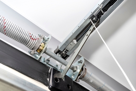 Close up of garage door springs.